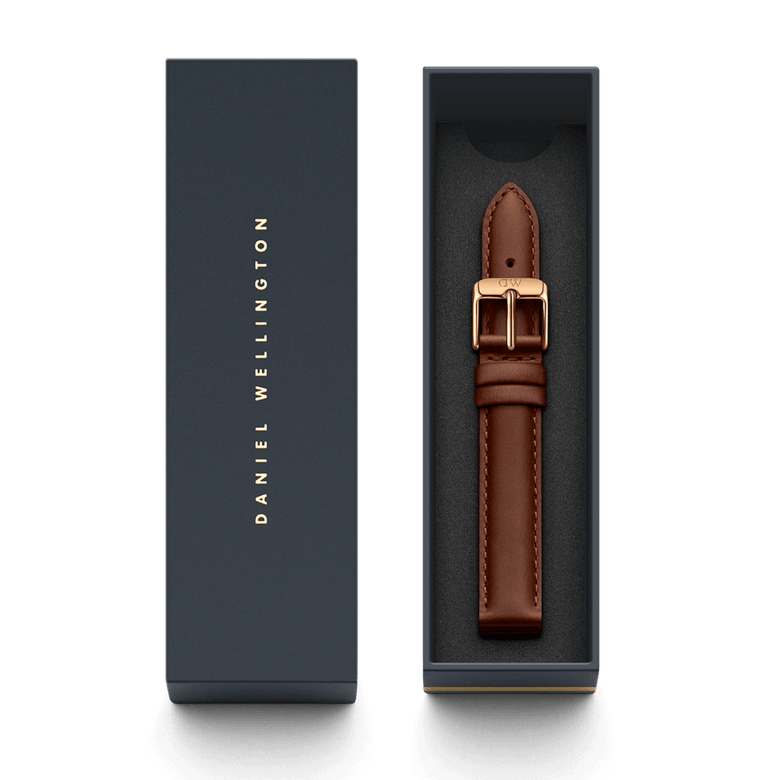 St Mawes Strap Rose Gold presented in a Daniel Wellington gift box, featuring a genuine brown leather watch strap with a rose gold buckle and fine stitching, ideal for gifting or updating your timepiece.