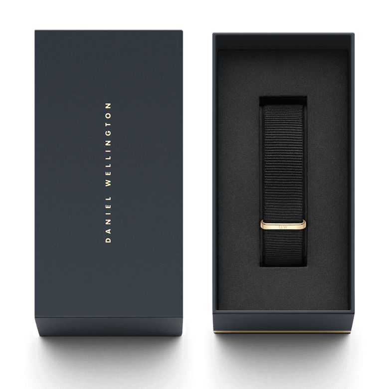 Cornwall Strap Rose Gold presented in a sleek Daniel Wellington gift box, featuring a black NATO-style polyester watch strap with a rose gold buckle for a refined and versatile upgrade.