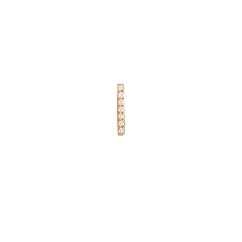 A slim gold bar stud earring set with seven sparkling cubic zirconia crystals, showcasing a minimalist and elegant design.