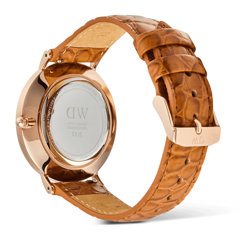 Rear view of the Classic Roman Numerals Date Light Brown Croc Belly Rose Gold watch, showing the rose gold case, engraved case back, and light brown croc-embossed leather strap with a matching rose gold pin buckle.