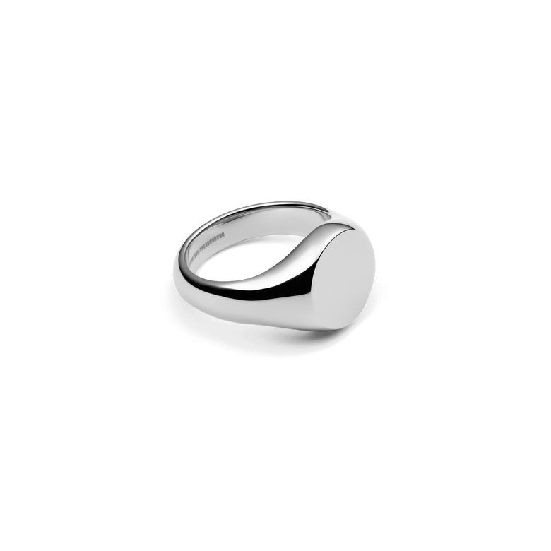 Classic Signet Ring Silver shown from a side angle, featuring a smooth, polished silver finish and a broad, minimalist face for a modern, understated style.