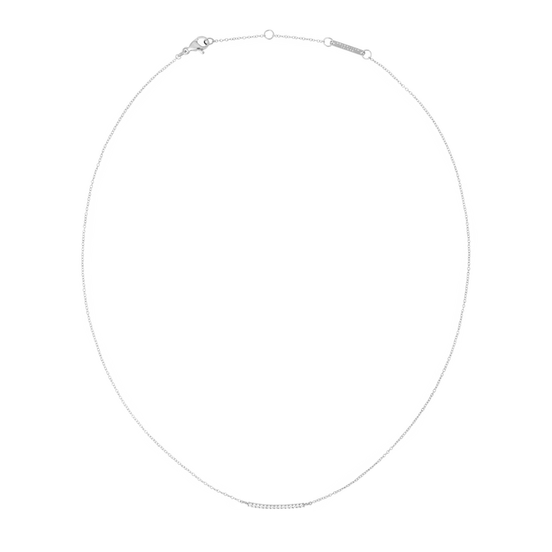 Slender silver necklace with a minimalist chain and a delicate bar pendant set with sparkling white cubic zirconia, featuring an adjustable clasp for versatile styling.