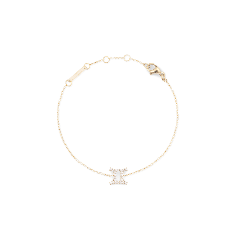 Crystal Zodiac Chain Bracelet Gold featuring a slim gold chain with adjustable sizing rings and a sparkling Gemini zodiac charm at the centre.