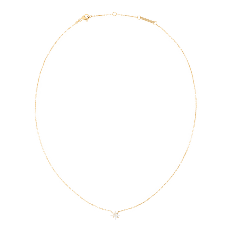 Fine gold chain necklace with a petite star-shaped pendant set with white cubic zirconia crystals, featuring an adjustable clasp for a comfortable fit.