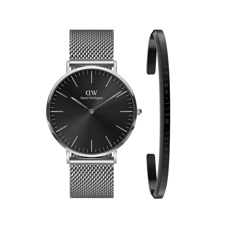Classic Mesh Onyx watch with a black dial and stainless steel mesh strap, paired with a slim silver bracelet featuring Daniel Wellington branding, displayed side by side for a coordinated, modern look.