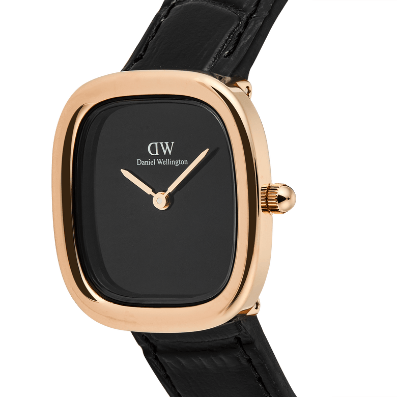 Close-up of the Margot Reading Onyx Ceramic Rose Gold ladies watch, highlighting its polished rose gold rectangular case, minimalist black dial, and pressed croc black leather strap.