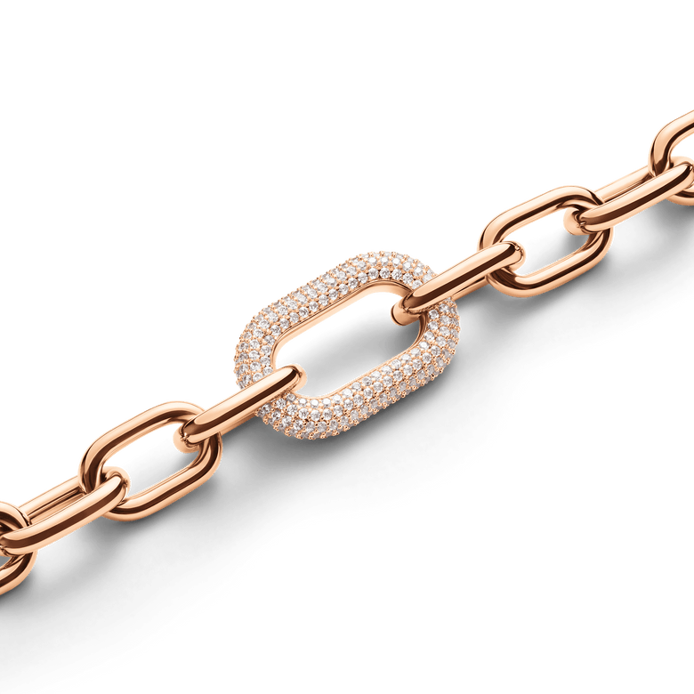 Close-up of the Crystal Link Necklace Rose Gold showcasing the chunky rose gold chain and a centre link encrusted with sparkling cubic zirconia crystals for a refined, modern finish.