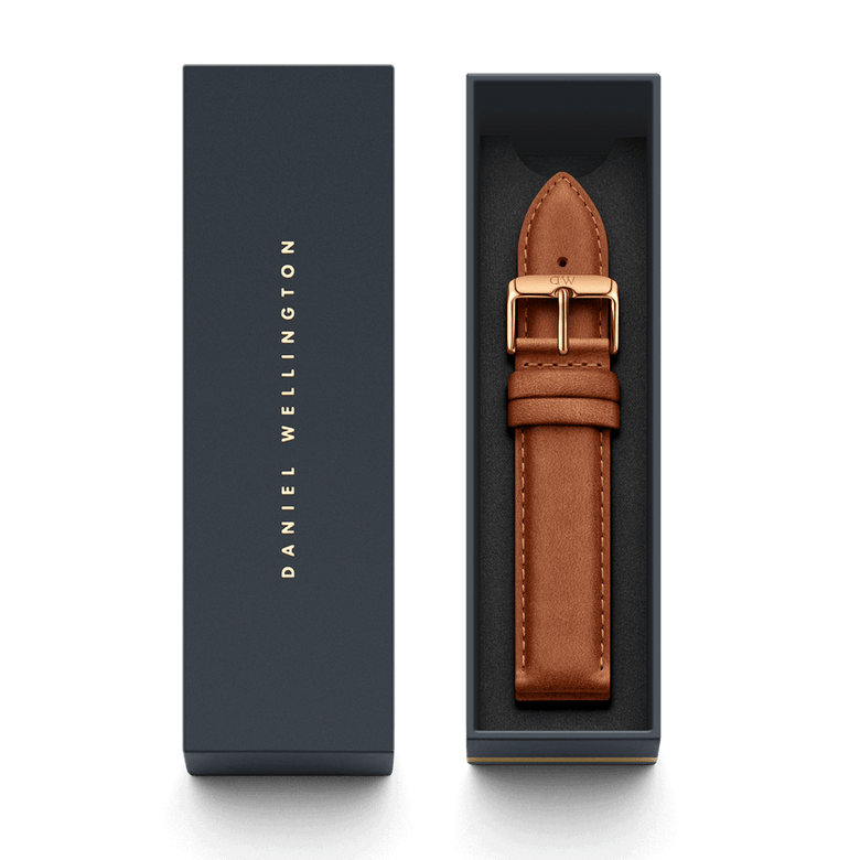 Durham Strap Rose Gold presented in a sleek Daniel Wellington gift box, featuring a light brown genuine leather strap with a polished rose gold buckle and refined stitching.