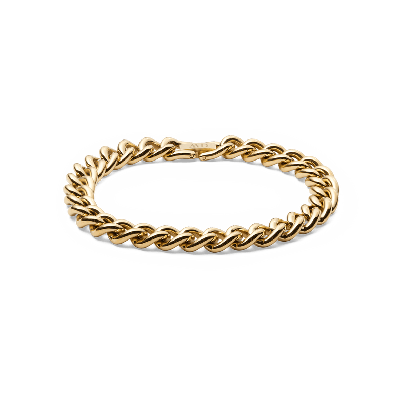 Chunky Chain Bracelet Gold featuring polished gold-plated stainless steel links and a secure fold-over clasp, designed for a bold yet elegant look.