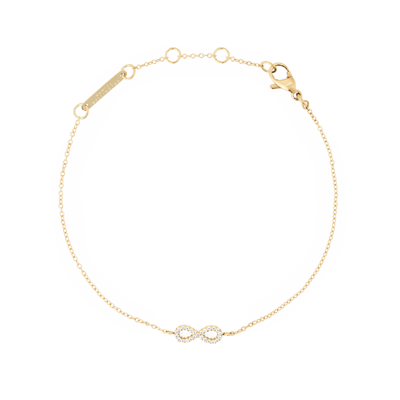 Delicate gold chain bracelet featuring an infinity symbol set with sparkling white cubic zirconia crystals, adjustable in length with a secure lobster clasp.