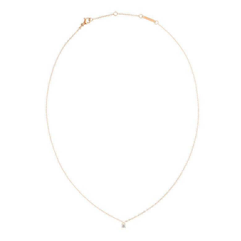 Mirelle Solitaire Necklace Rose Gold shown laid flat, featuring a slim adjustable rose gold chain with a single white cubic zirconia pendant at the centre.