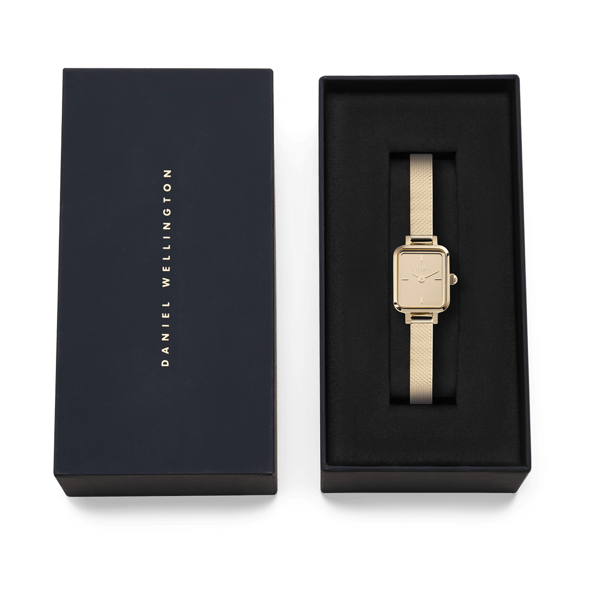 Quadro Mini Reflection Gold presented in a sleek black Daniel Wellington gift box, highlighting its slim rectangular gold case and elegant mesh strap, ideal for gifting or adding to your collection.