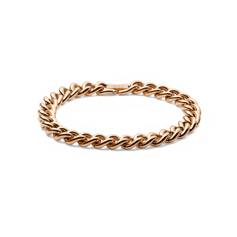 Chunky Chain Bracelet Rose Gold featuring bold, interlocking links with a polished rose gold finish and a secure fold-over clasp, designed for a statement yet refined look.