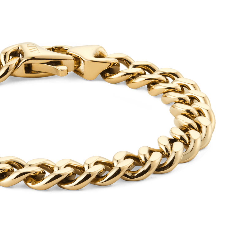 Close-up of the Ellipse Cuban Chain Bracelet Gold, showing the chunky, polished gold links and secure lobster clasp detail.