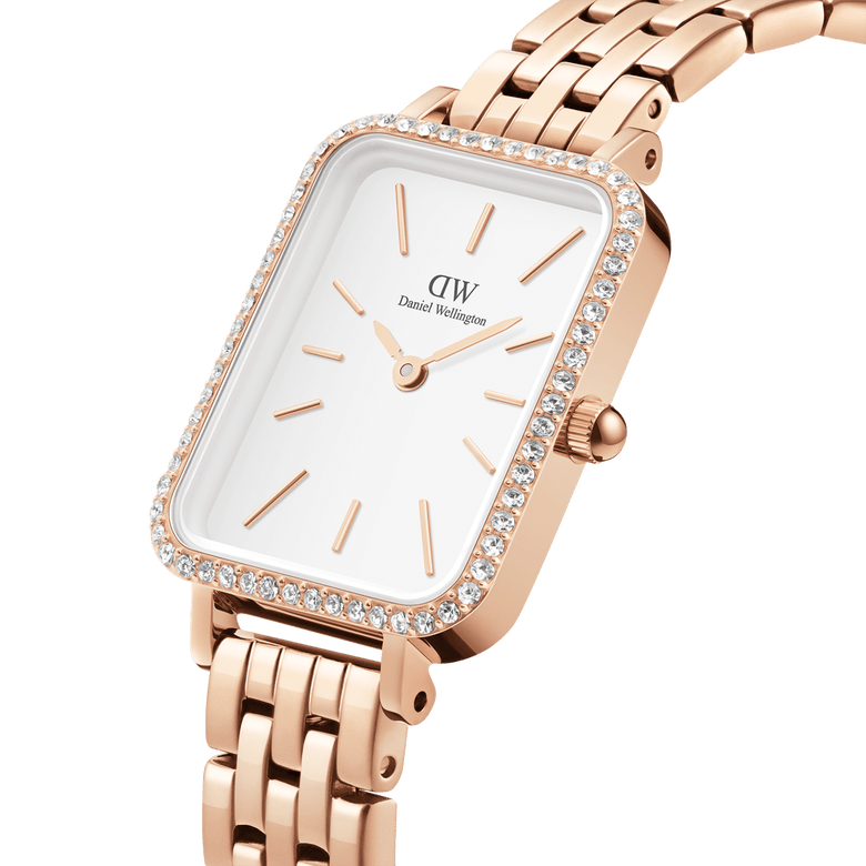 Close-up of the Quadro Lumine Bezel 5-Link Melrose, showing its rose gold rectangular case, crystal-set bezel, white minimalist dial, and five-link strap, highlighting its elegant and refined design.