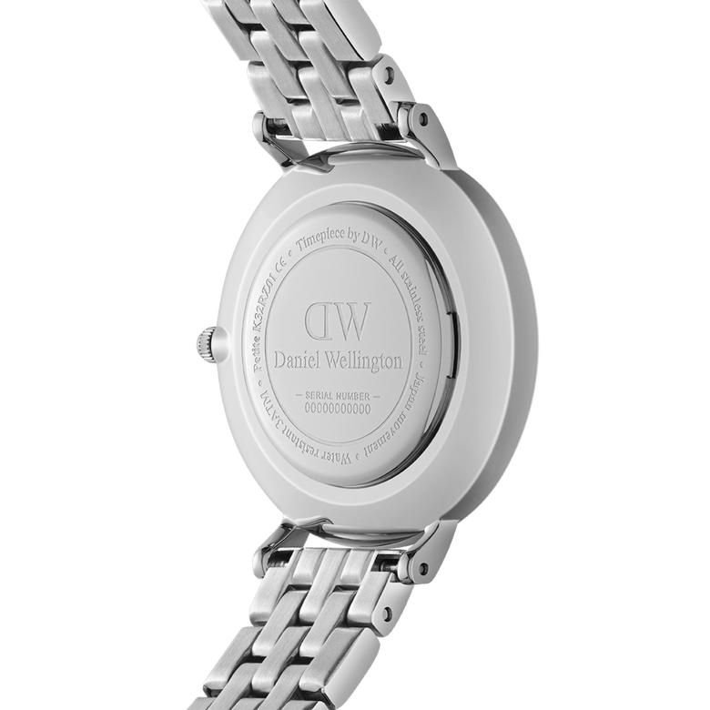Close-up of the back of the Petite Lumine Bezel 5-Link Arctic S, showing the engraved stainless steel case and polished silver 5-link bracelet.