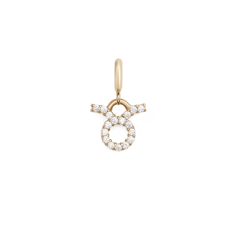 Gold Taurus zodiac watch charm adorned with sparkling cubic zirconia crystals, featuring a classic round and horned design in a secure claw setting for versatile styling with watches or bracelets.