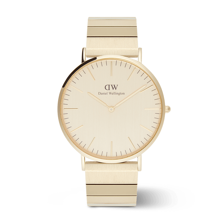 Classic Piano Link Gold Unitone men’s watch with a brushed gold 40mm dial, minimalist face, and a modern geometric piano link bracelet in matching gold tone.