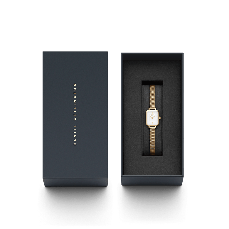 Quadro Mini Evergold gold watch with a rectangular case and mesh strap, elegantly presented in a branded Daniel Wellington gift box, ideal for gifting or daily wear.