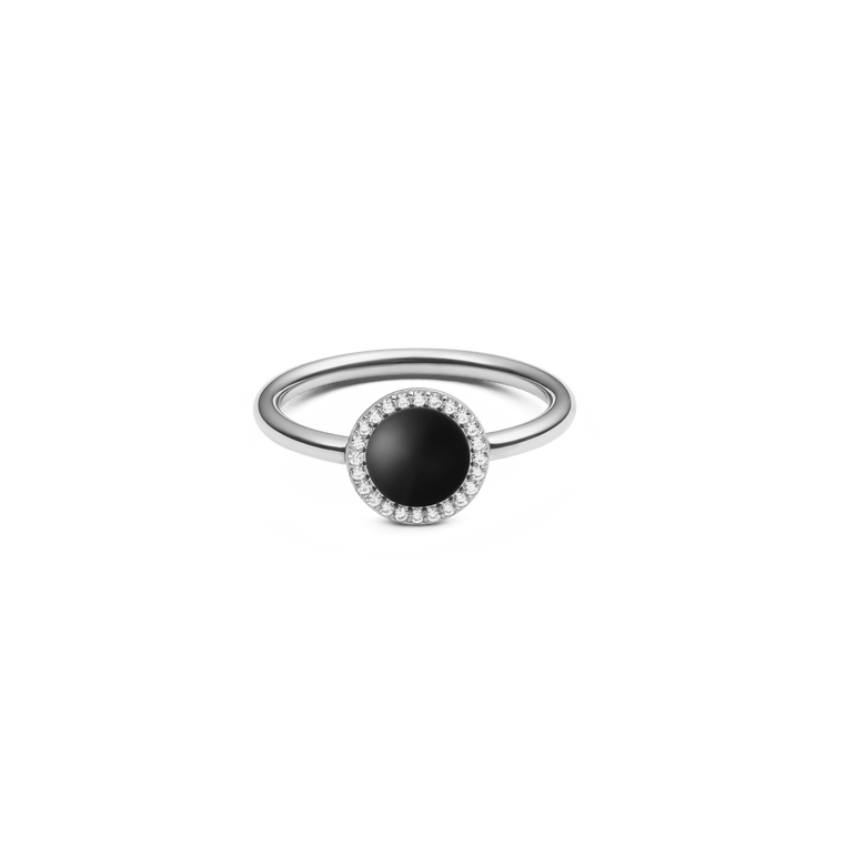 Silver ring with a round black agate centrepiece, encircled by sparkling white cubic zirconia, highlighting its elegant and contemporary style.