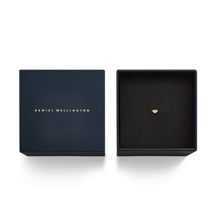 Heart Stud Gold earring presented in an elegant Daniel Wellington box, highlighting its petite heart shape and polished gold finish, ideal for gifting or adding a refined touch to your jewellery collection.