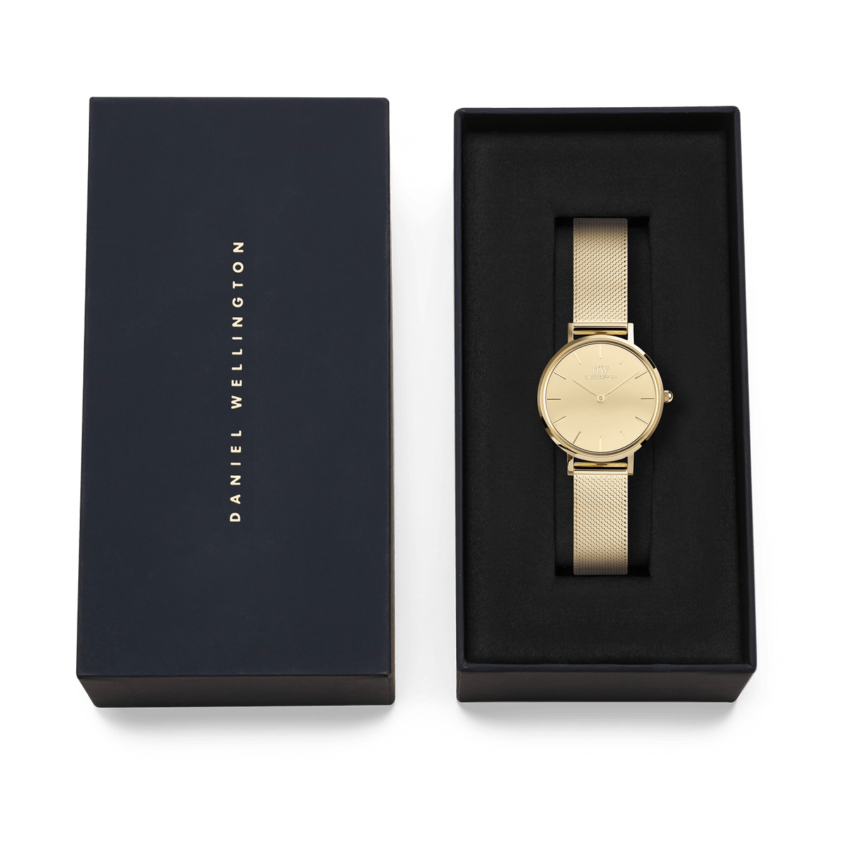 Petite Reflection Gold watch by Daniel Wellington with a gold mesh strap and minimalist gold dial, displayed in an elegant black gift box with the brand name on the lid.