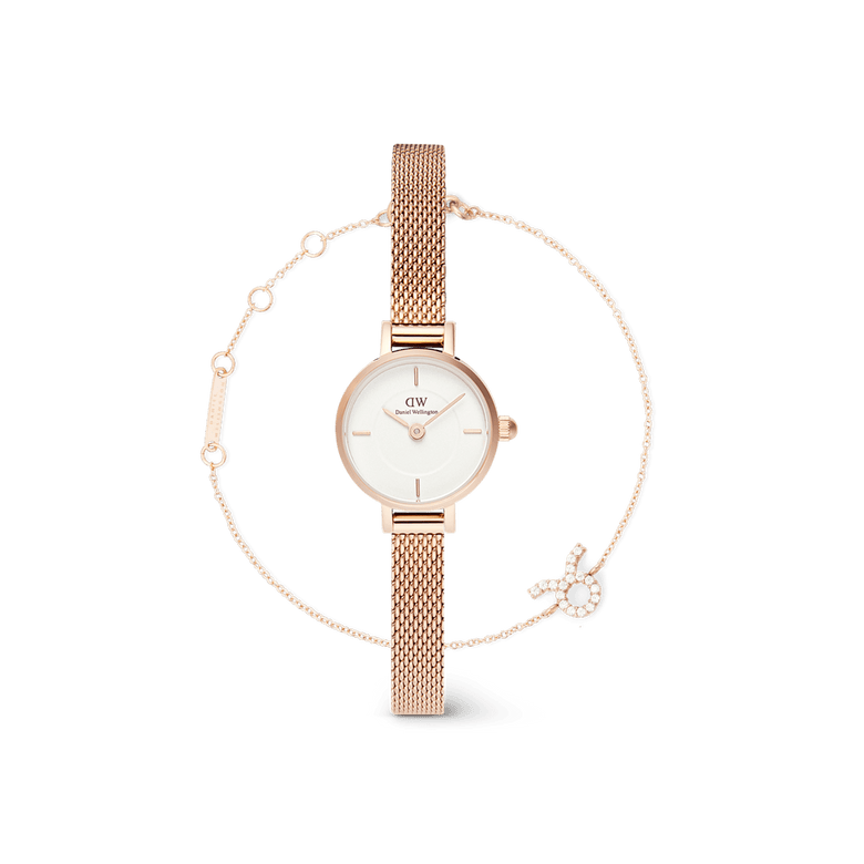 Rose gold ladies watch with a white dial and mesh strap, paired with an adjustable rose gold zodiac chain bracelet featuring a sparkling crystal charm, both designed for a refined and minimalist look.