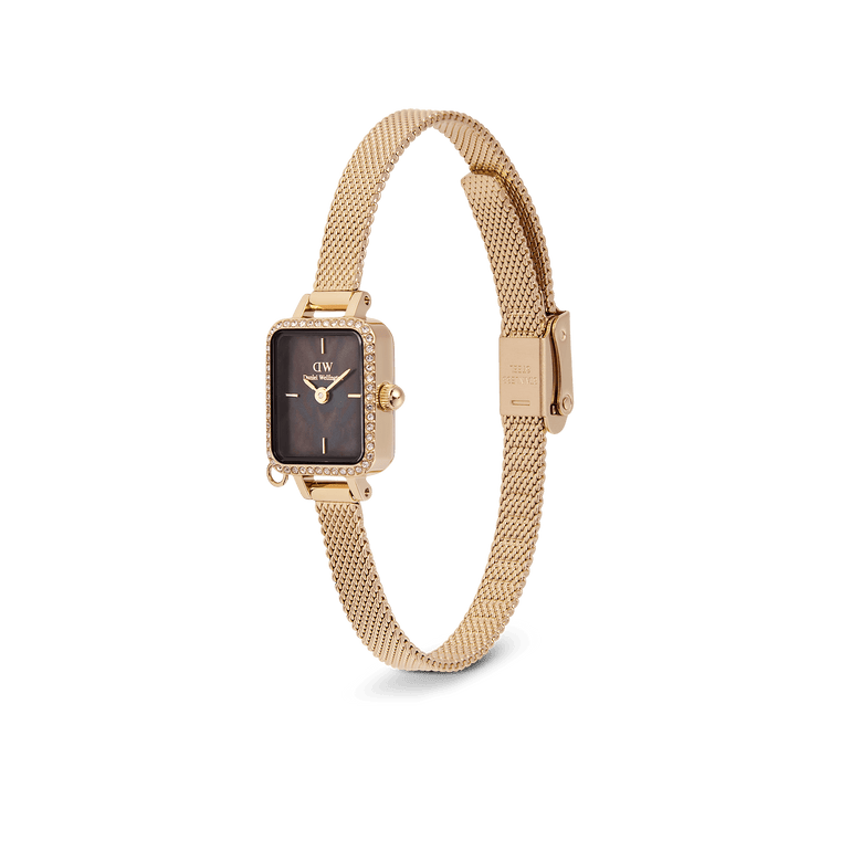 Daniel Wellington Quadro Mini Crystal Zodiac Evergold Set with a rectangular gold case framed by crystals, black mother of pearl dial, and an adjustable gold mesh strap, designed for women who appreciate elegant and personalised accessories.