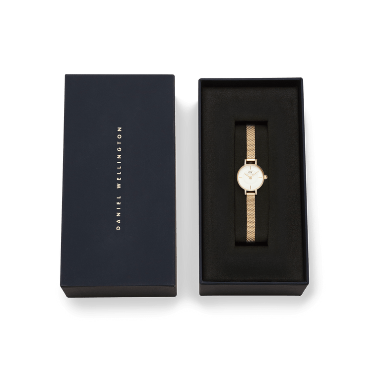 Petite Mini Evergold gold mesh strap watch presented in a sleek black Daniel Wellington gift box, showcasing its minimalist white dial and elegant gold finish, ideal for gifting on special occasions.