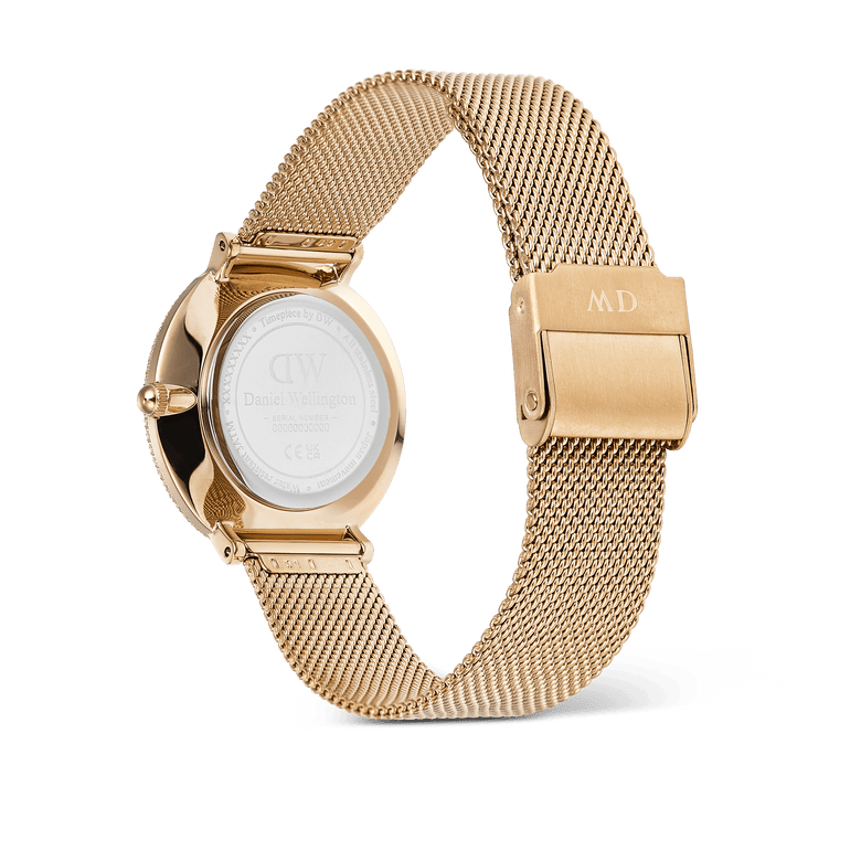 Back view of the Crystalline Bezel Evergold Green gold ladies watch, showing the engraved stainless steel case and the adjustable gold mesh strap with a secure clasp.