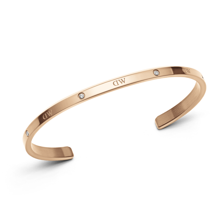 Classic Lumine Bracelet RG in rose gold, featuring a slim adjustable cuff with six sparkling crystals and a smooth, minimalist finish suitable for everyday wear or layering with other jewellery.