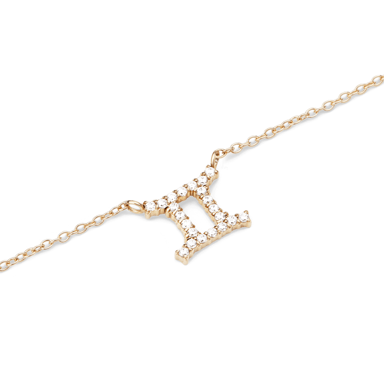 Gold chain necklace with a Gemini zodiac pendant, set with sparkling hand-placed crystals for a polished and personal finish.