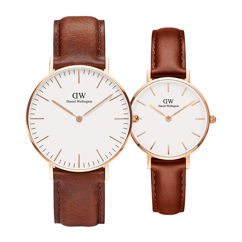 Classic & Petite St Mawes Rose Gold set featuring two Daniel Wellington ladies watches with warm brown leather straps, rose gold cases, and minimalist white dials, shown side by side to highlight the difference in case sizes.