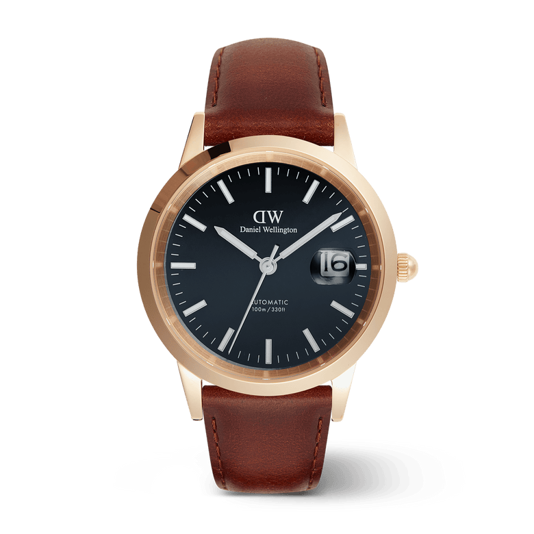 Iconic St Mawes Automatic Rose Gold watch featuring a blue enamel dial, rose gold-plated stainless steel case, and a brown Italian leather strap, with luminous markers and a date display.