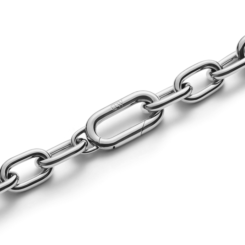 Detail of the Crystal Link Bracelet Silver showing the polished spring gate clasp integrated into the chunky stainless steel chain for a secure and seamless finish.