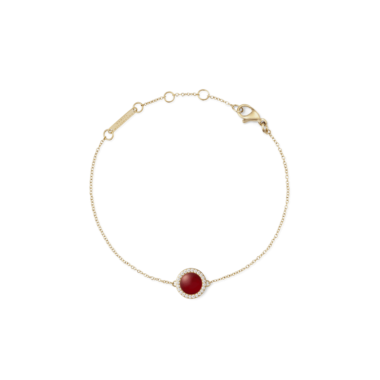 Delicate gold bracelet featuring a slim adjustable chain and a central domed red agate stone, surrounded by a halo of sparkling white cubic zirconia crystals.