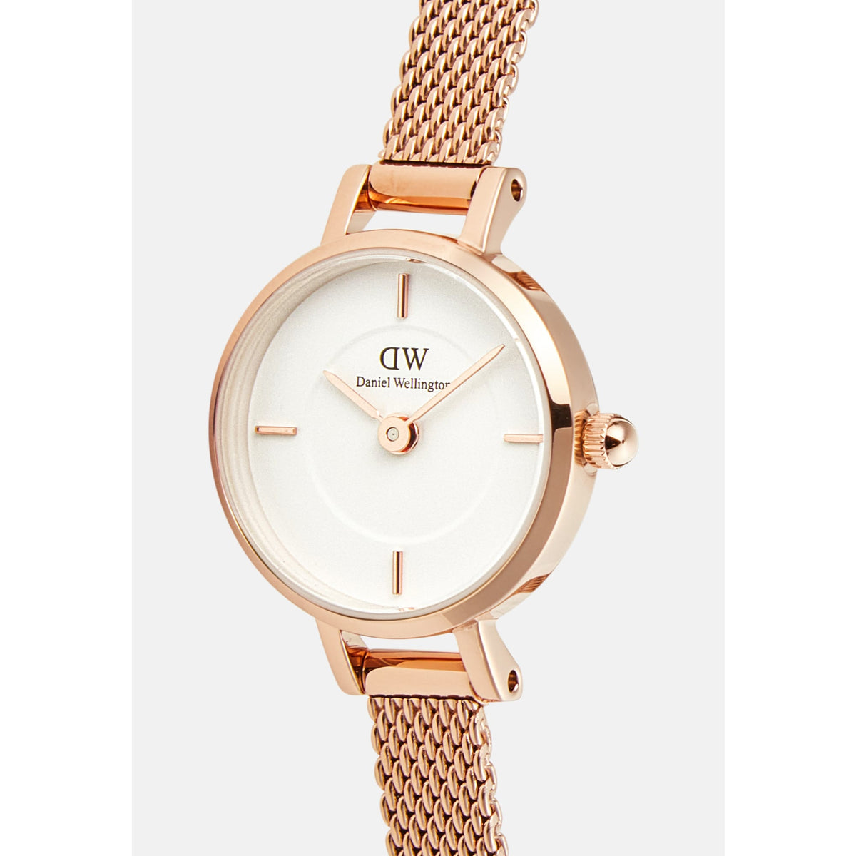 Close-up of the Petite Mini Melrose ladies watch showing the minimalist white dial, rose gold case, and fine mesh strap, highlighting its elegant and refined detailing.