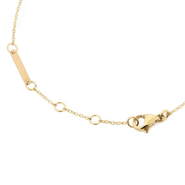 Detail of the Mirelle Eternity Bracelet Gold showing the adjustable gold chain, secure clasp, and branded bar, designed for a comfortable and elegant fit.