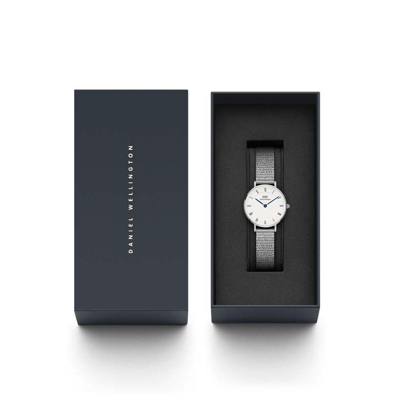 Petite Roman Numerals Sterling ladies watch with a silver mesh strap and white dial, presented in a sleek Daniel Wellington gift box, ideal for gifting or personal use.