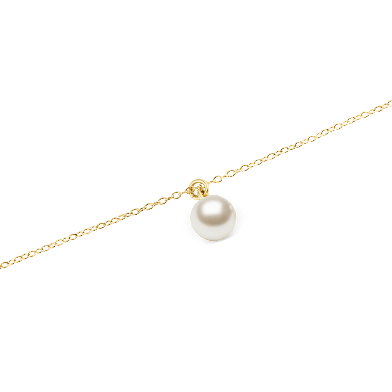 Close-up of the Pearl Necklace Gold showcasing a single Swarovski glass pearl pendant on a slim gold-toned chain, highlighting its minimalist and refined design.