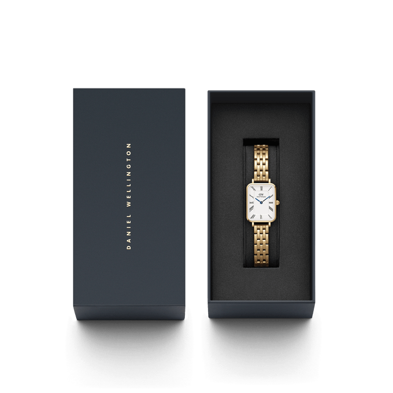 Quadro Roman Numerals 5-Link Gold ladies watch presented in a sleek Daniel Wellington gift box, featuring a rectangular white dial with Roman numerals and a polished gold 5-link bracelet.