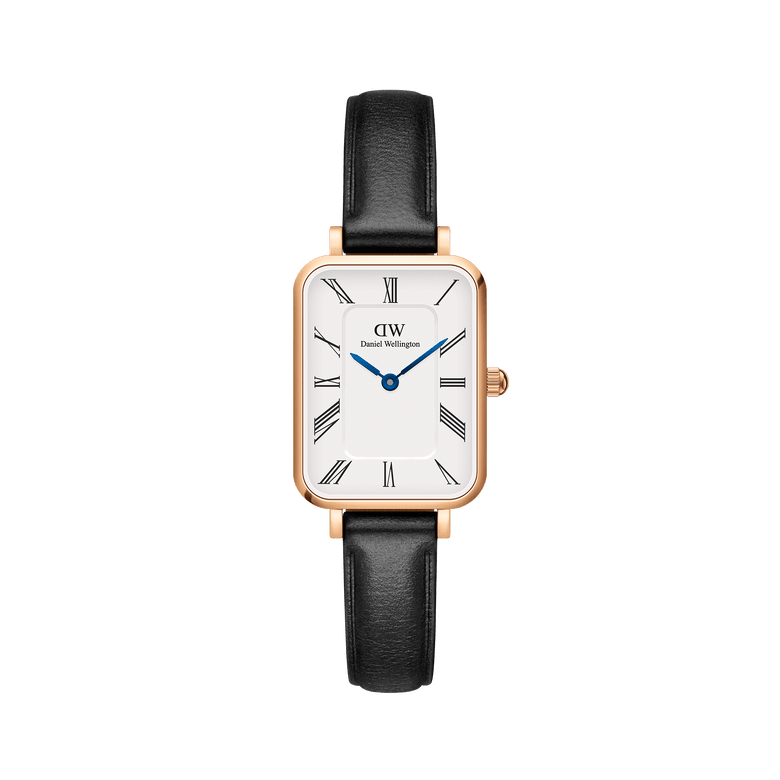 Quadro Roman Numerals Sheffield Rose Gold ladies watch with a rectangular rose gold case, white dial featuring Roman numerals and blue steel hands, paired with a slim black leather strap.