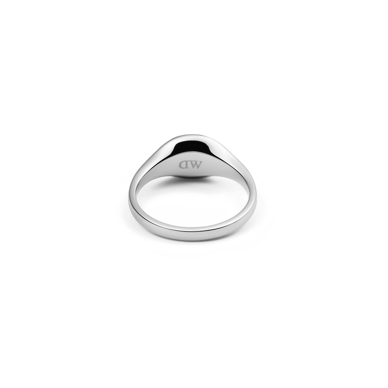 Classic Mini Signet Ring Silver shown from the inside, highlighting the smooth inner band and polished stainless steel finish with a discreet engraved detail.