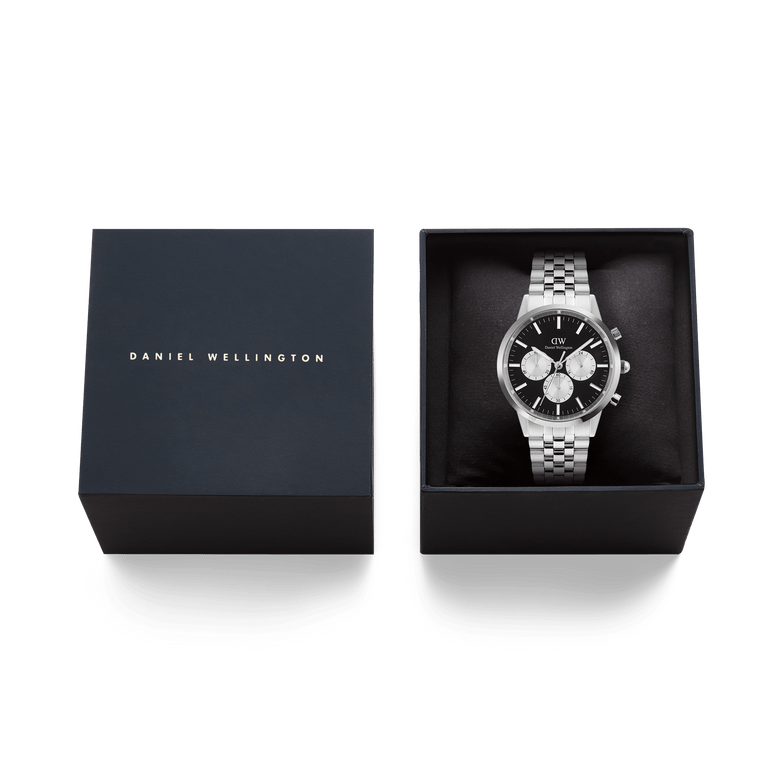 Iconic Chronograph Arch 5-Link Onyx Panda Silver men's watch presented in a branded Daniel Wellington gift box, featuring a black dial with white sub-dials and a polished stainless steel bracelet.