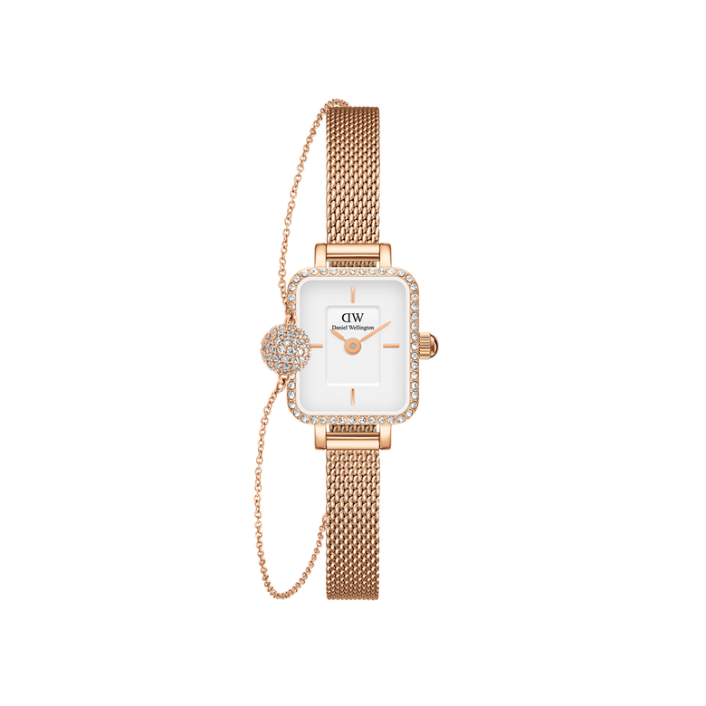 Rose gold Quadro Mini Lumine watch with a rectangular white dial, pavé crystal bezel, and matching mesh strap, paired with an adjustable pavé crystal pendant bracelet featuring a sparkling charm.