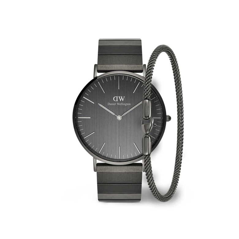 Classic Piano Link Graphite Unitone & Mesh Bracelet Set featuring a graphite coloured stainless steel watch with a minimalist round dial and an adjustable mesh bracelet, both designed for a sleek, modern look.