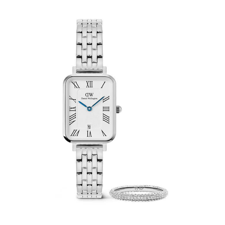 A rectangular Daniel Wellington Quadro 5-Link silver watch with a five-link stainless steel strap and Roman numeral dial, paired with a slim silver Pavé Ring featuring pavé crystal detailing, both displayed against a plain background.