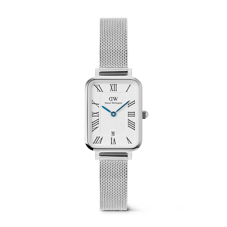 Quadro Sterling Roman Numerals Date ladies watch with a rectangular silver case, white dial featuring Roman numerals, blue hands, date window at 6 o’clock, and a polished silver mesh strap.
