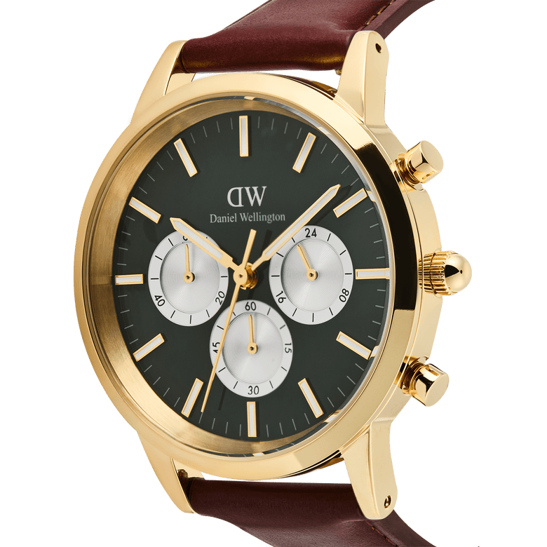 Close-up of the Iconic Chronograph St Mawes Emerald Panda Gold men’s watch, featuring a gold case, emerald green dial with panda sub-dials, luminous hands, and a brown padded leather strap.