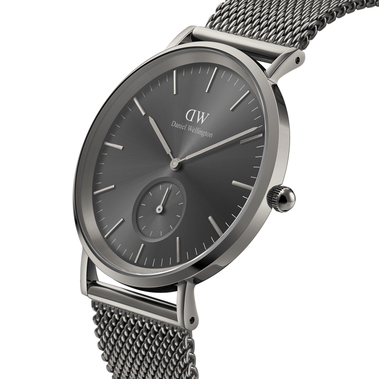 Classic Multi-Eye Mesh Graphite men's watch with a graphite sunray dial, minimalist markers, and a stainless steel mesh strap, shown from a side angle to highlight its sleek case and modern design.